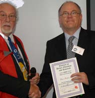 DAve Foster being presented with his membership certificate